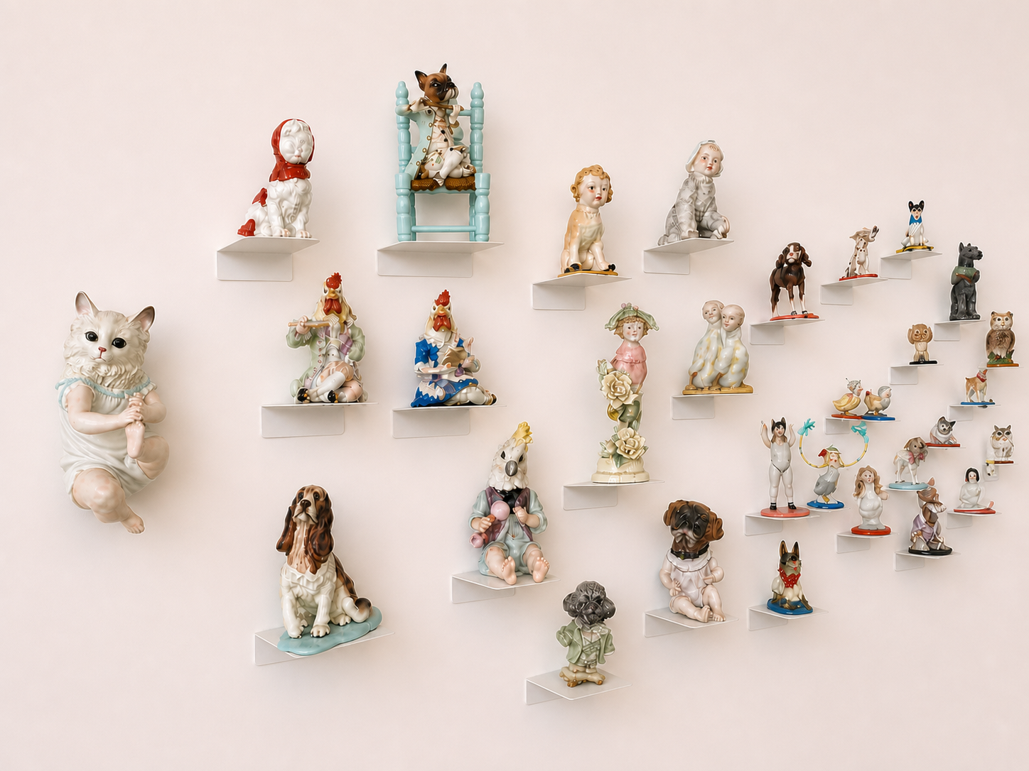 Studio wall of ceramic chimera sculptures on floating shelves